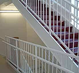 White stairs ornamental railing