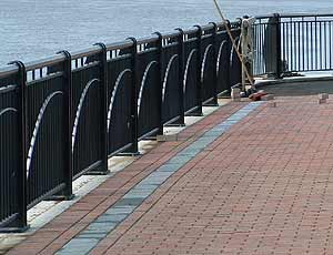 Waterfront metal bollards and railing