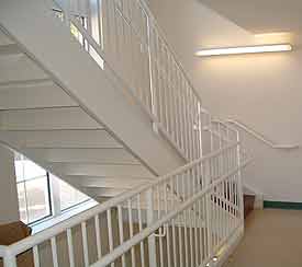 White staircase railing